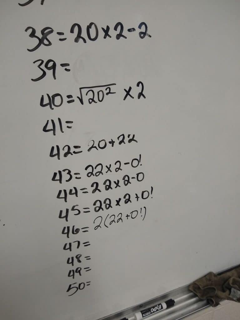 Student Solutions to 2022 Challenge Written on Dry Erase Board 