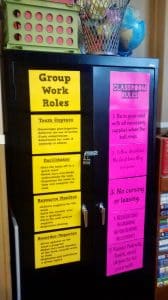 classroom rules posters hanging on cabinet in math classroom.