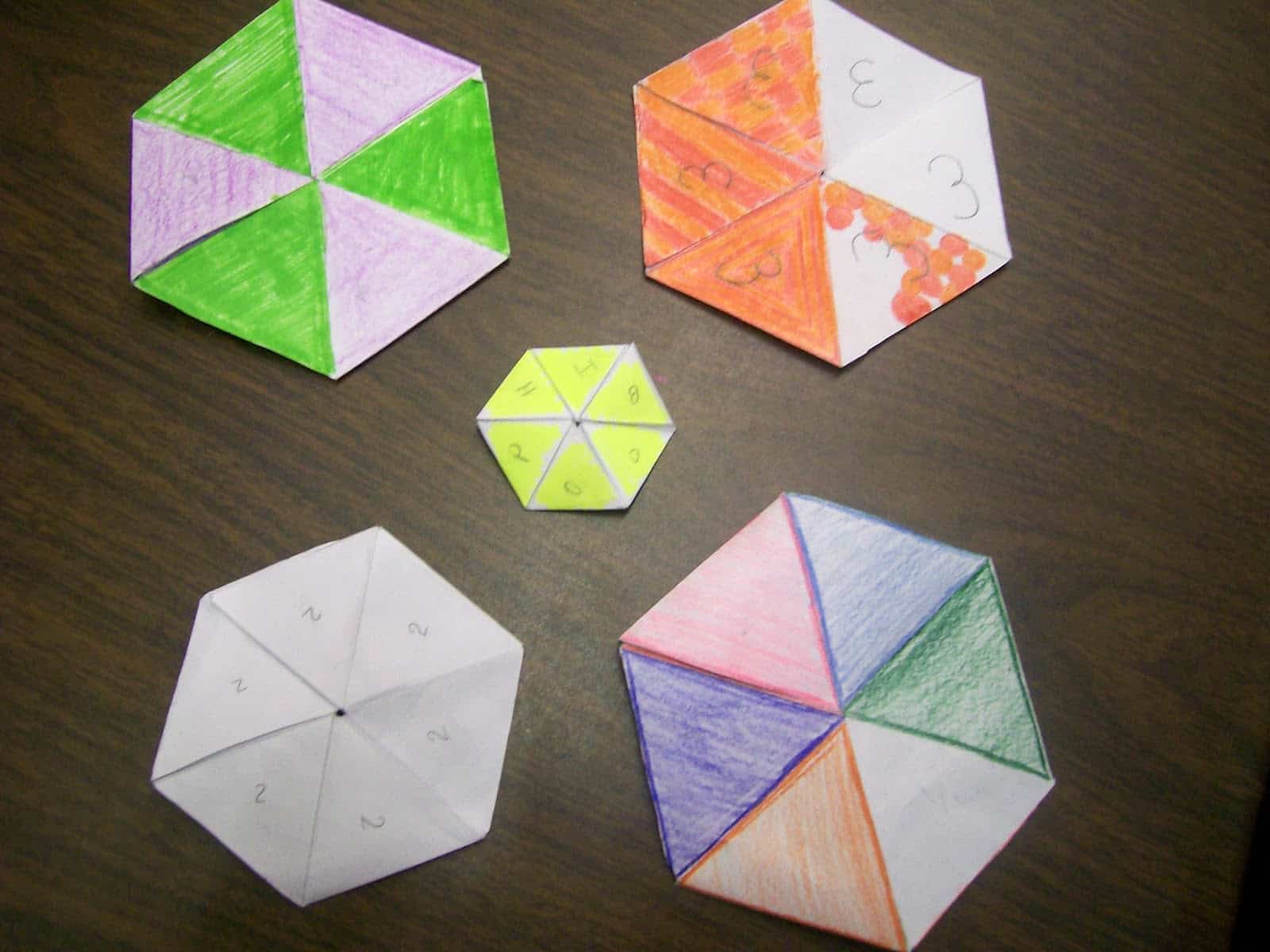 colored hexaflexagons on desk.